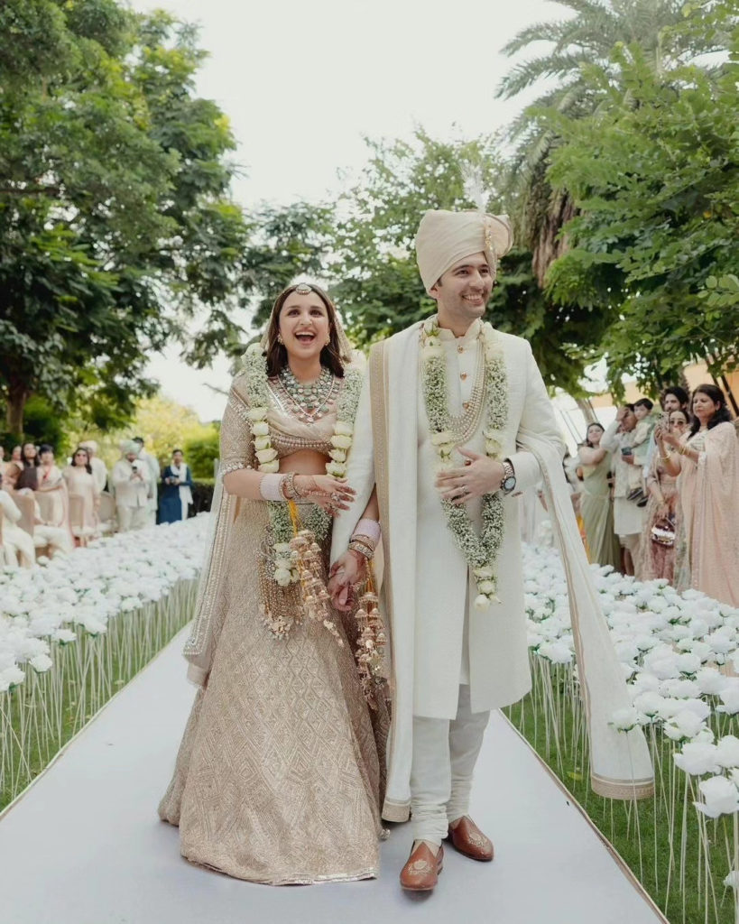 Parineeti Chopra and Raghav in ivory for their wedding