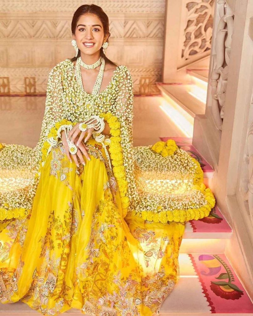 Radhika Merchant in yellow Anamika Khanna for her haldi