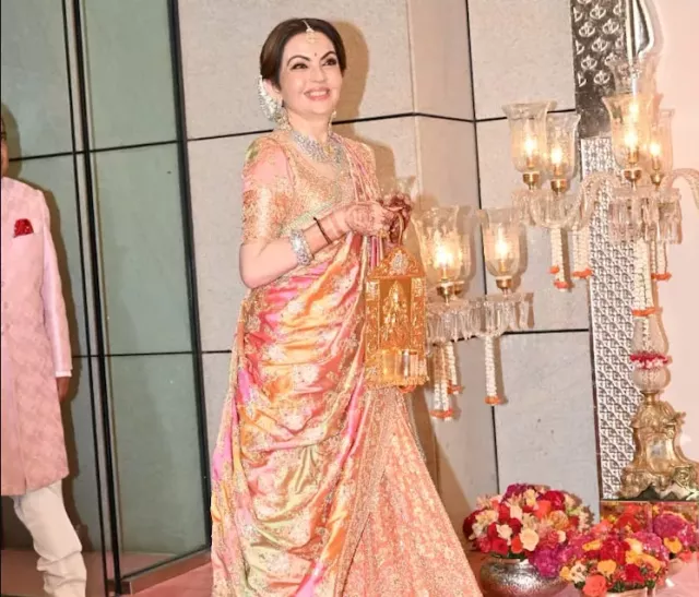 Nita Ambani with Raman Divo